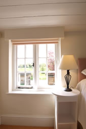 View from bedroom over the meadow and river